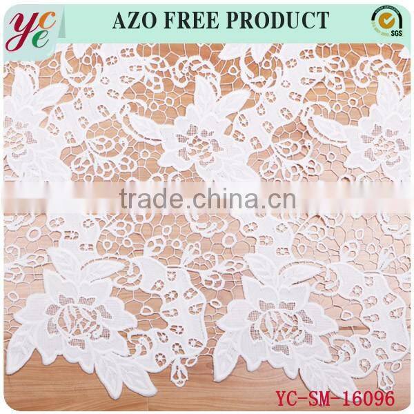 Pure white bloom pattern hollow woven fabrics embroidery fabric for wedding dress