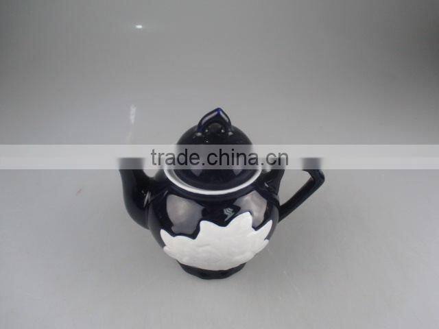 Glazed porcelain teapot in stock