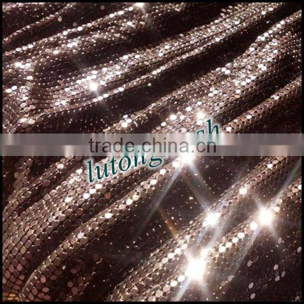 Metal sequin drapery for room divider