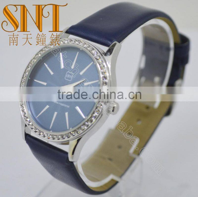 Navy texture dial with stone topring watch, smooth navy leather strap