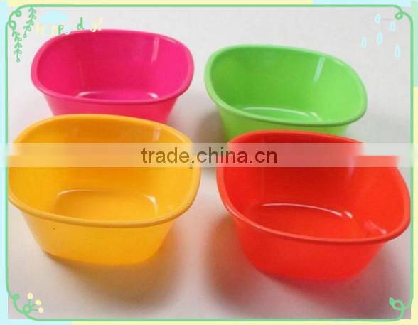 plastic orange and food bowl