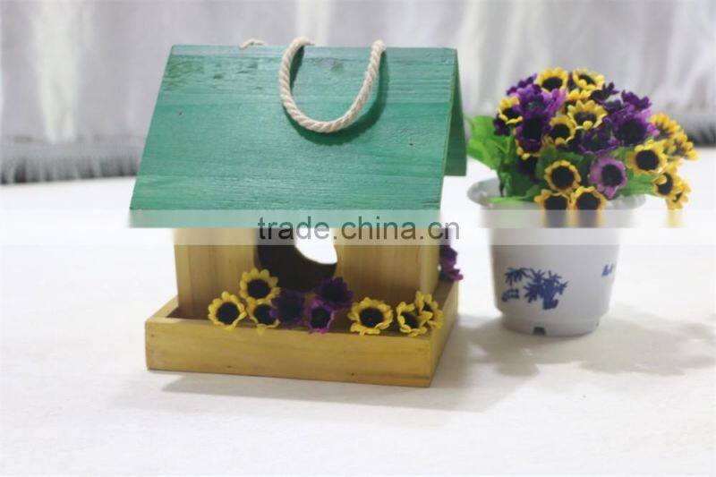 Finished colorful handmade wooden bird nest