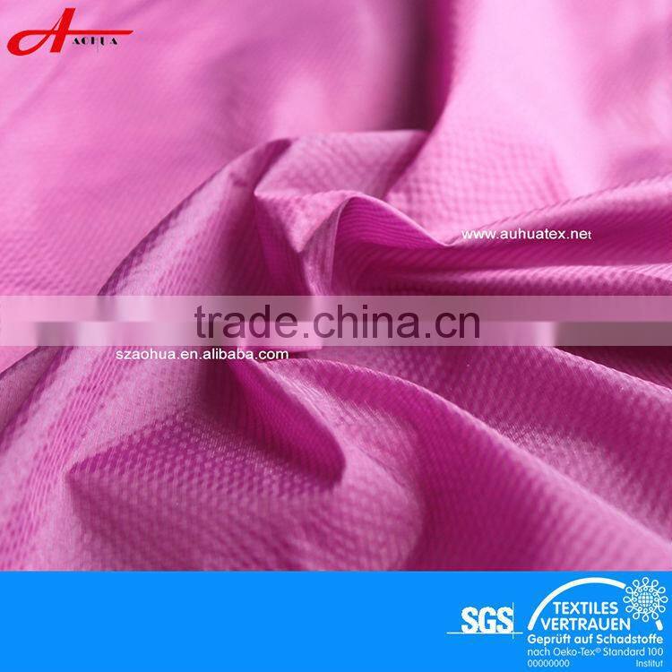 Nylon cire waxed grid fabric