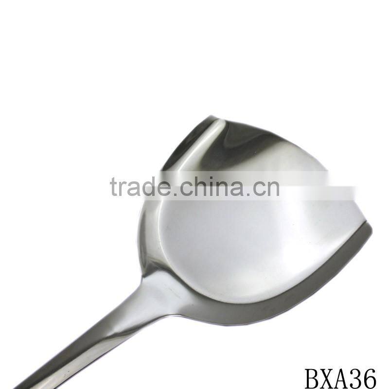 Professional stainless steel cooking spatula with wood handle
