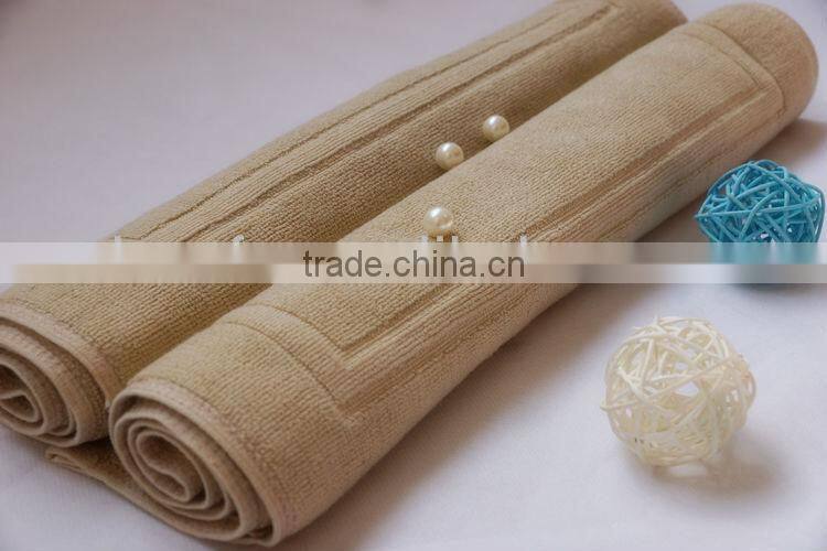 100% cotton bath mat, jacquard design with border edges, solid dyed color