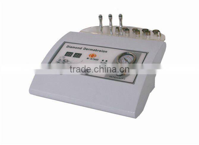 Portable diamond tip microdermabrasion machine