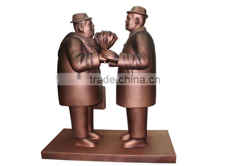 resin statue of two good friends in the color of copper