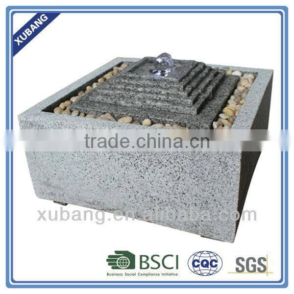 garden pyramid fountain with square base with lighted fountain