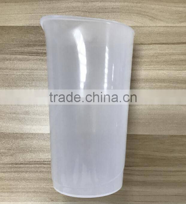 White mini household hand blender with stainless steel blades