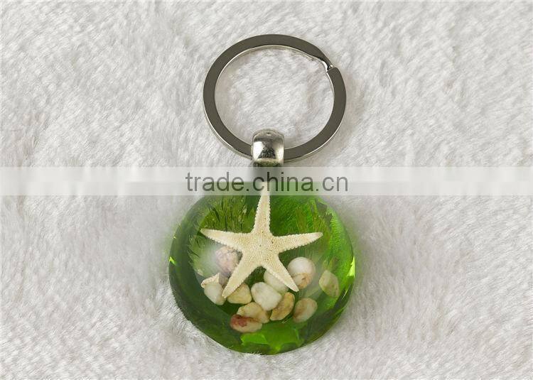 Promotional round shape butterfly and starfish fashion key chain