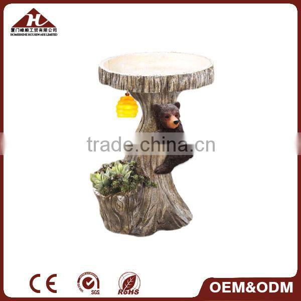tree bird feeder with beer