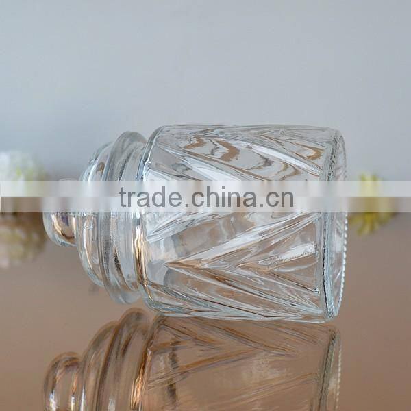Glass candle container with lid