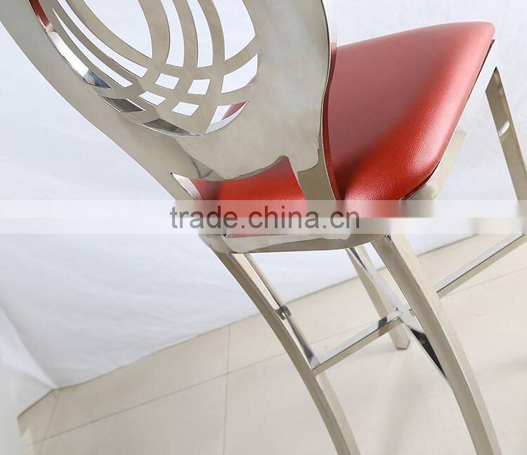 round back high chair with red soft seat