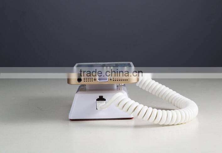 Security alarm charge retail display system for mobile phone