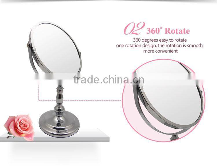 Round metal framed compact vanity mirror