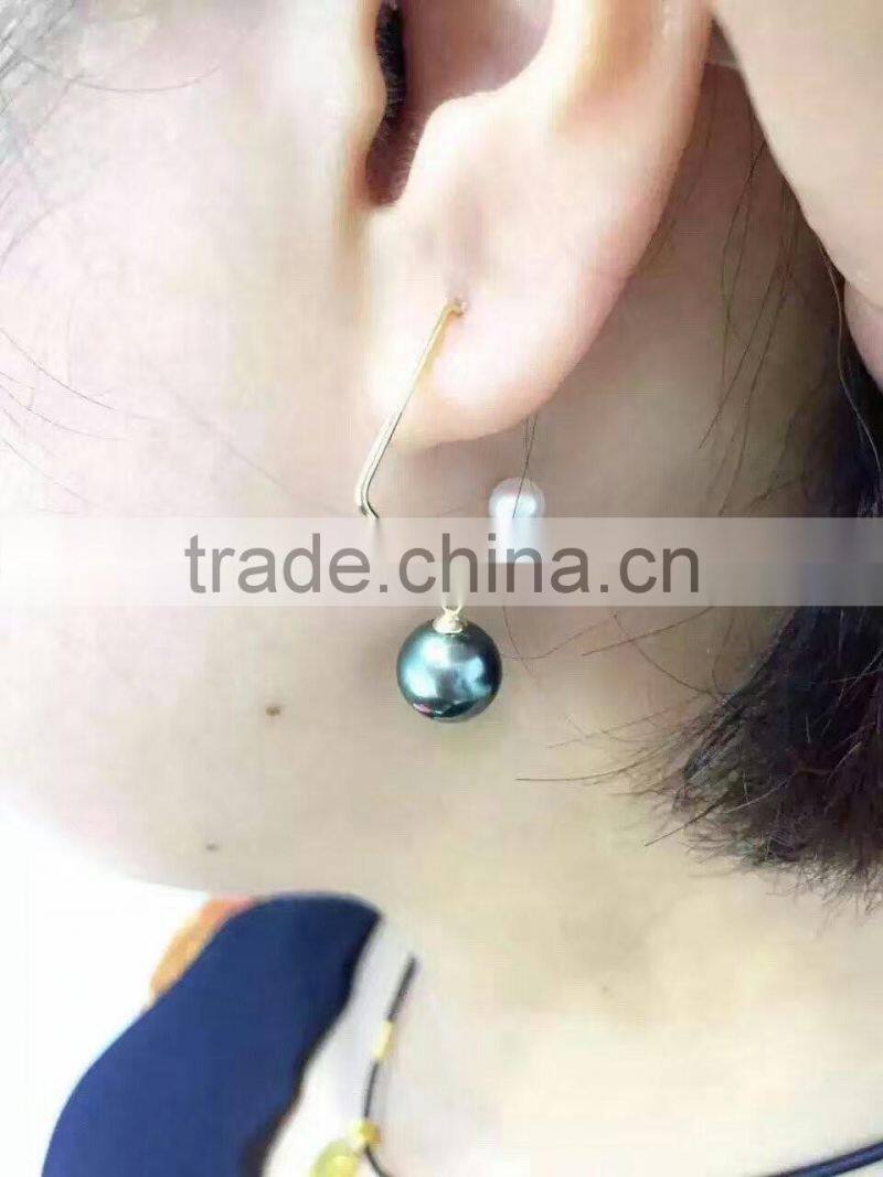4.5-5mm white Akoya pearl earrings with 12mm black Tahitian pearl earring