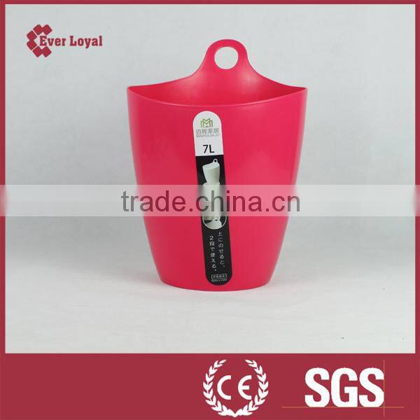 Bin stacks up to receive the bucket, plastic stacking box