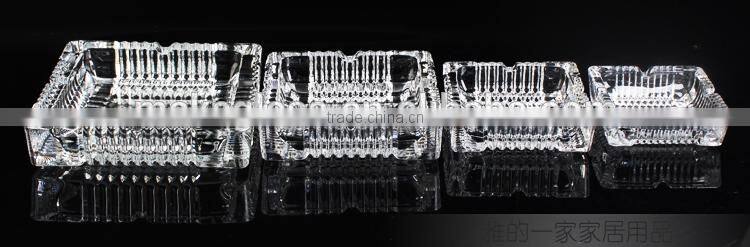 clear glass ashtray with different size square and round shape