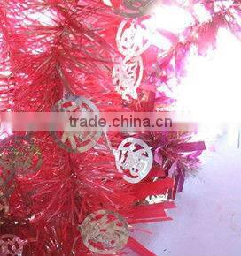 Tinsel Garland With Green Leaves and Red Fruit