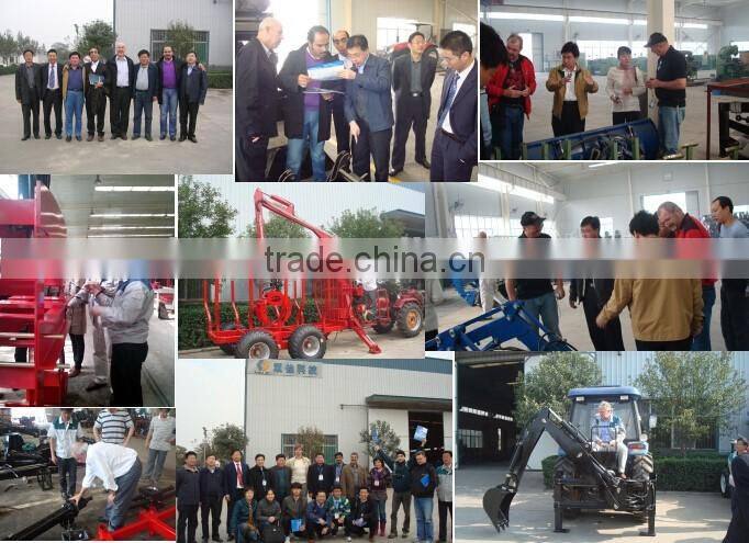 Tractor with 3 point hitch backhoe