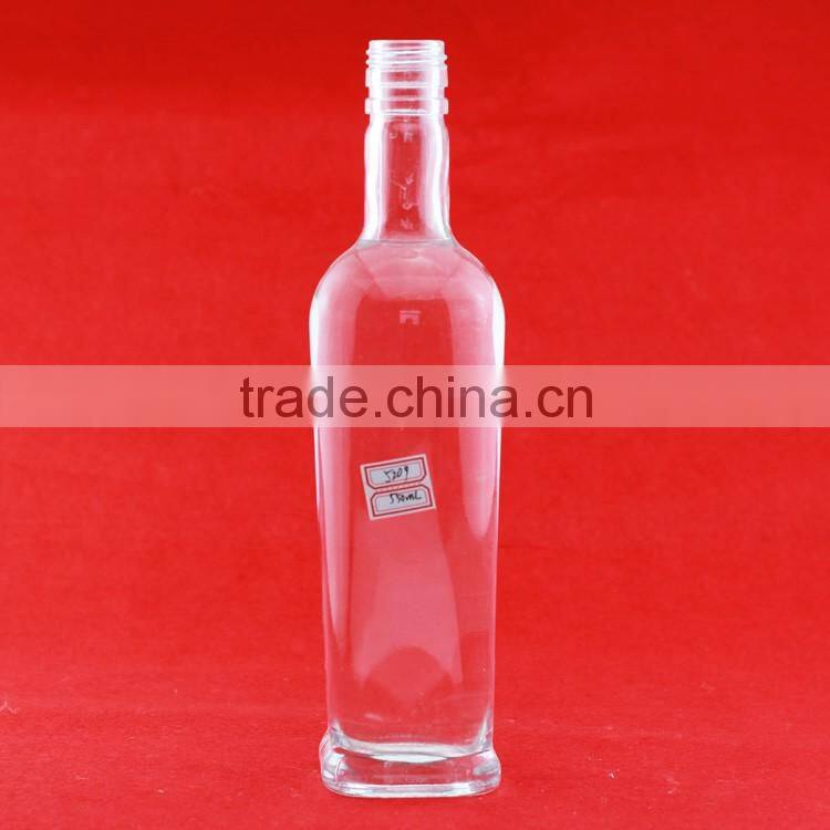 Cheap good long melon shape bottles iron tower bottle 500ml lamp shape liquor bottle