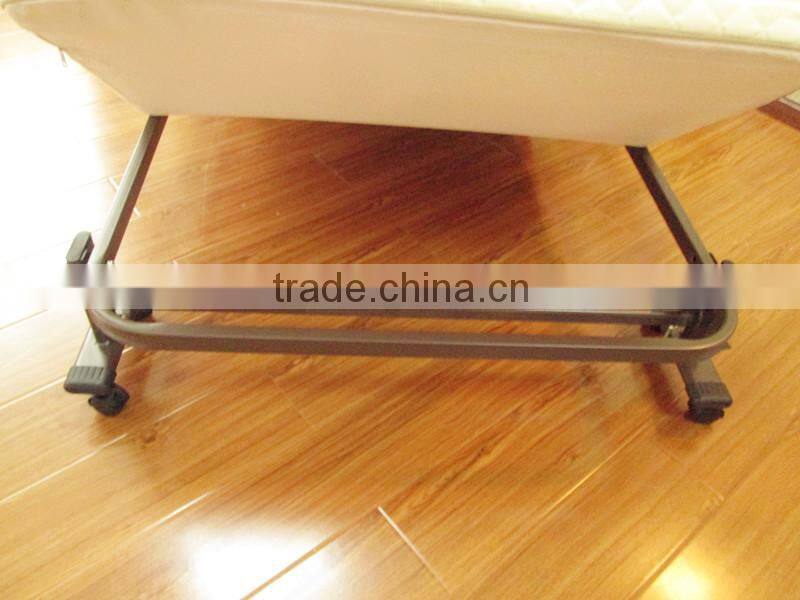 white guest room metal folding bed
