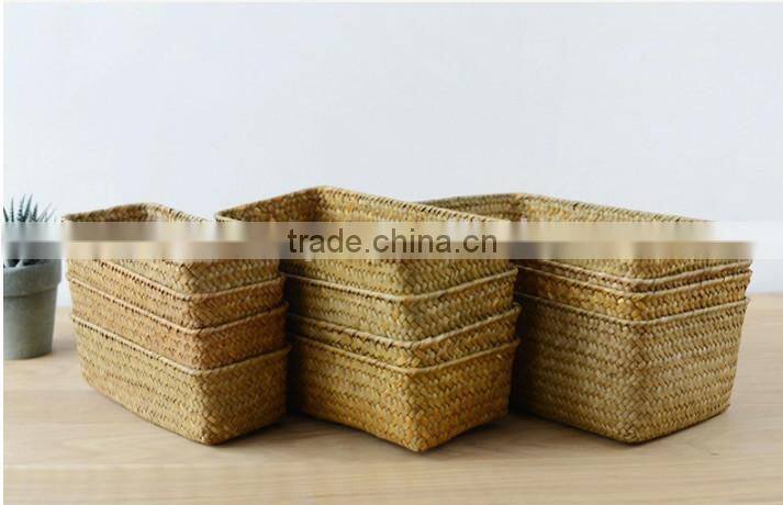 a basket made of natural straw seagrass for housewaring with no handle