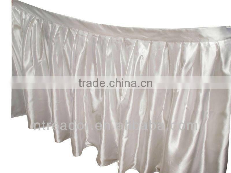 White satin table skirting for wedding