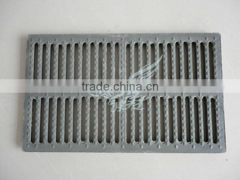 Light duty ductile iron manhole cover and grating