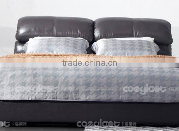 Super comfortable black leather bed