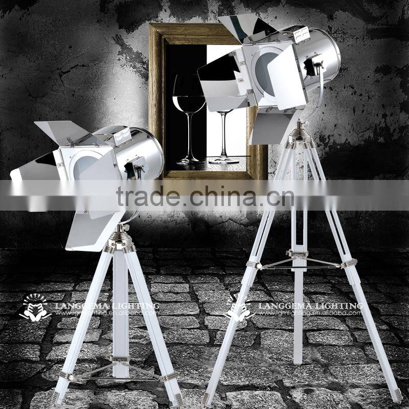 Black marine floor lamp with stainless steel shade and beech wood base