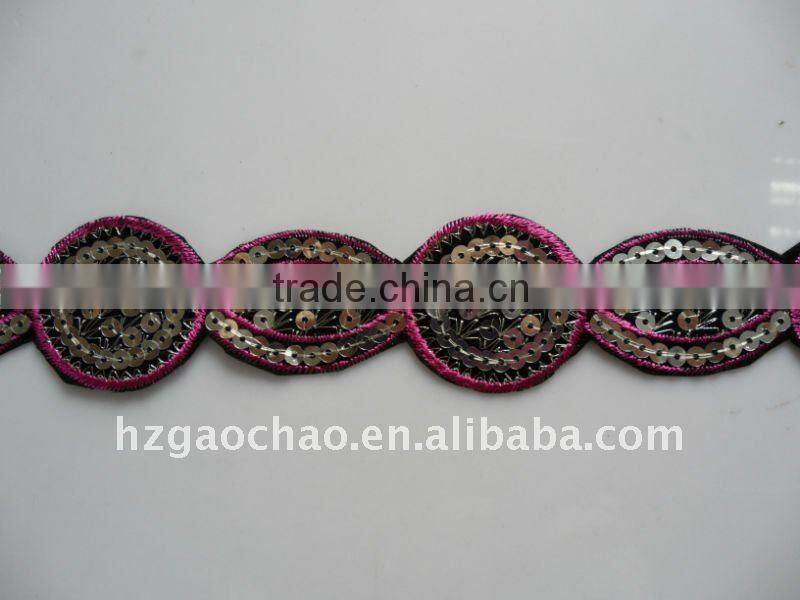 Hand triming sequin lace