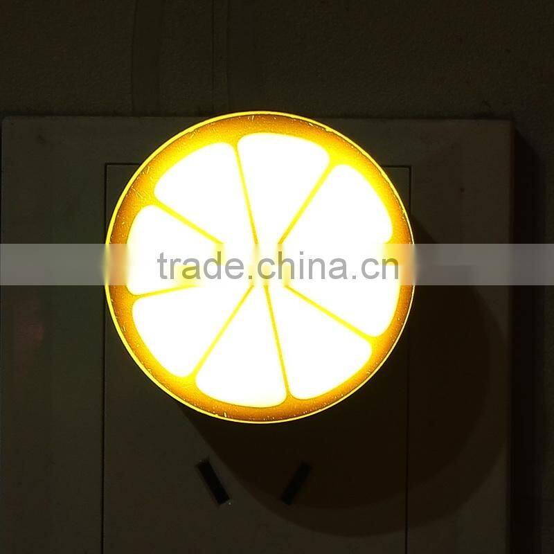 lemon shape LED night light with light sensor on wall for kids