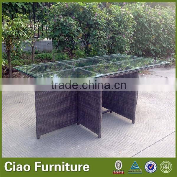 Space saving rattan cube dining table and 6 chairs