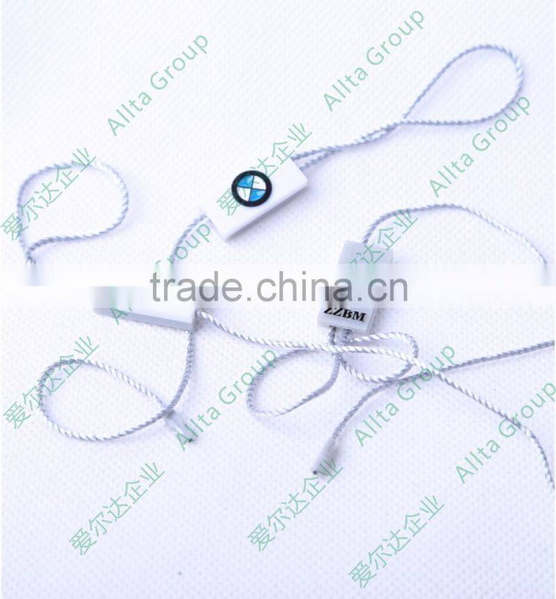 Custom plastic embossing seal tag for garment