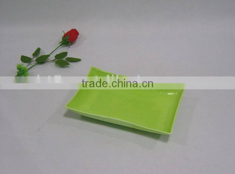 green color glazed round ceramic plate