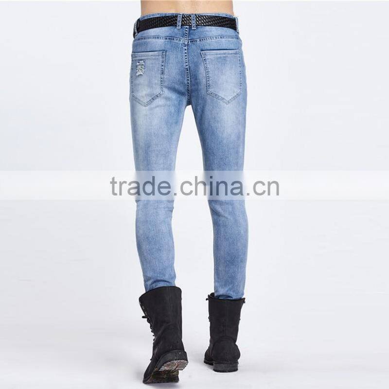 The new men's fashion men's jeans brand jeans hole personality male personality Slim comfortable pants