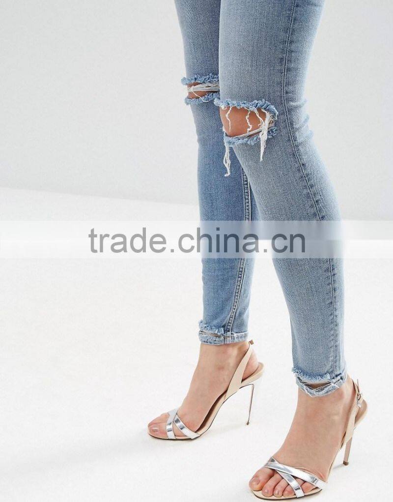 OEM service sales winter comfortable cotton jeans pent stonewash shredded knees for lady