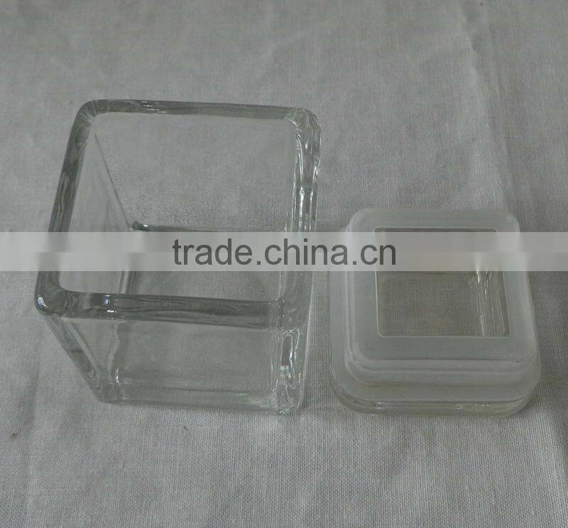 Cubic glass candle holder with lid