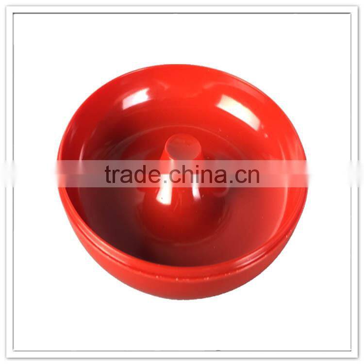 Lighter and cheaper bright red plastic ashtray