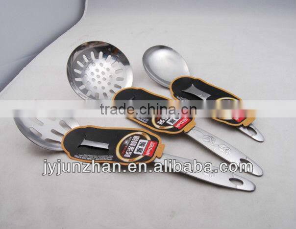 Stainless slotted turner with SS handle with rose on and low price