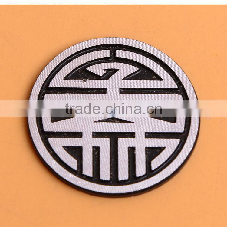 round metal handmade tag