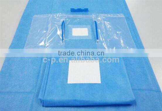 disposable eye surgical drape with pouch