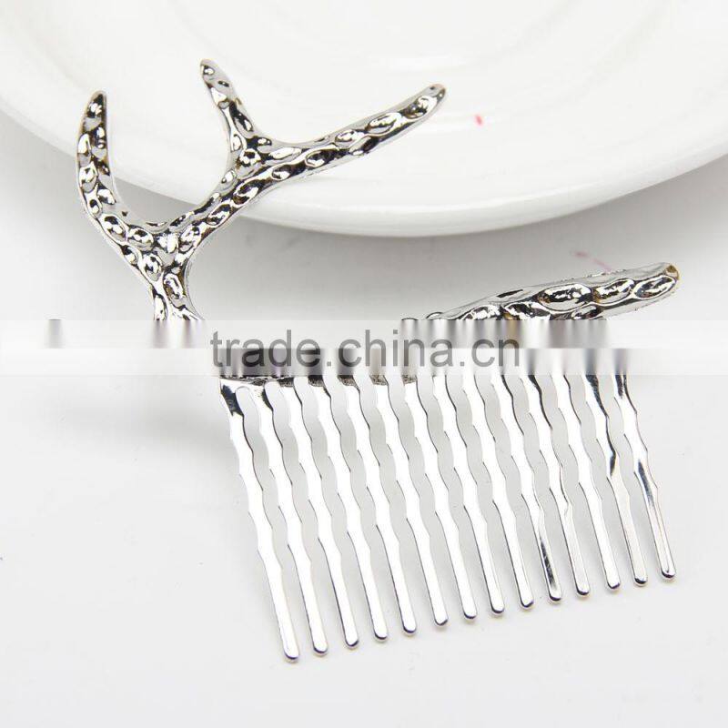 Stag Gold tone hair comb