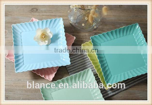colorful dinner plates set in square shape