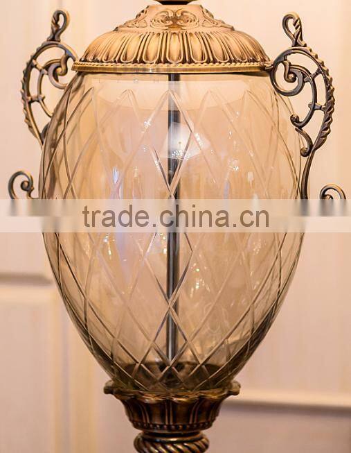 Olivary design clear glass body metal bottom fabric lampshade table lamp