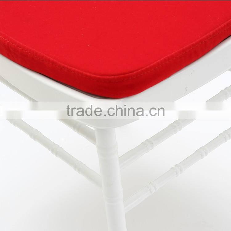 White colour chair and red cushion set with garden furniture outdoor