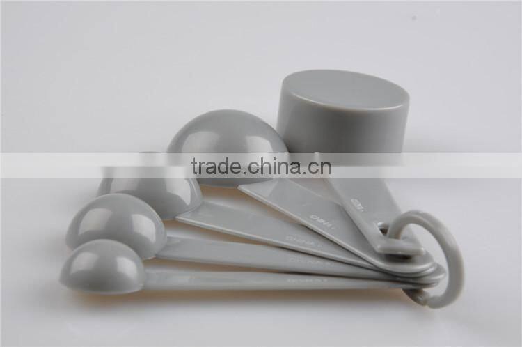 Small plastic measuring cups