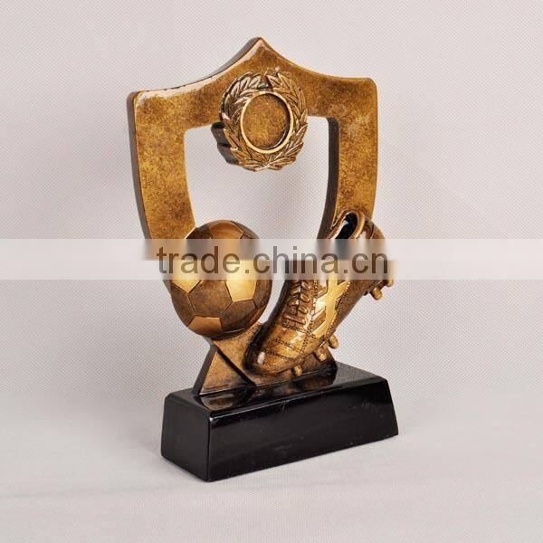 Gold plating football and boot resin trophy award