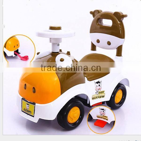 Hot sales CE approved children swing car,4 wheels cartoon cow children tricycle bicycle toys baby swing car with music
